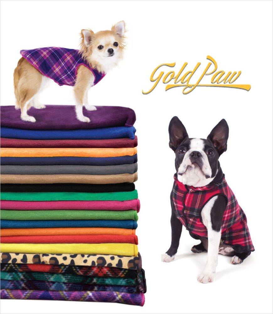 Chihuahua wearing a purple plaid fleece sweater standing on a stack of folded ones with a bull dog wearing a red plaid fleece sweater standing beside it with white background