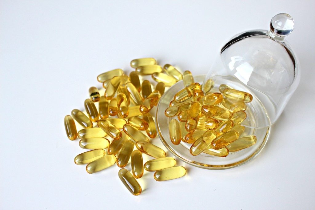 natural canine arthritis treatments-fish oil capsules